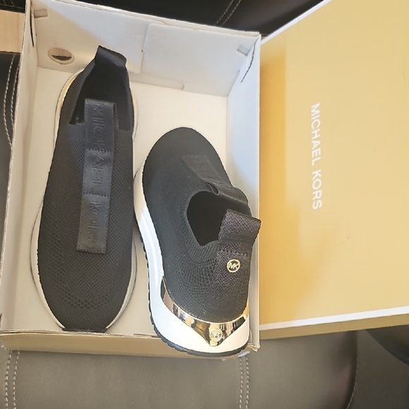 Michael Kors Black and Gold Slip-On Sneakers - Picture 1 of 2